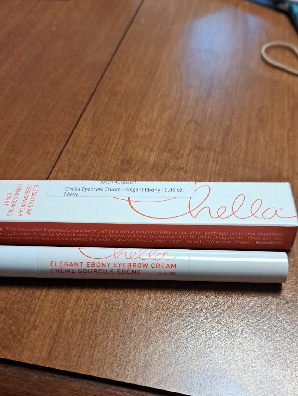 Chella Elegant Ebony Eyebrow Cream - White with Coral Logo